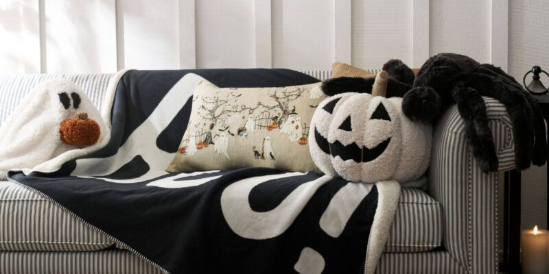 gus the ghost with pumpkin pillow